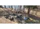 Lakeside area with a fire pit and canoe and kayak storage in the background at 6795 Montgomery Rd, Lake Wylie, SC 29710