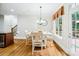 Bright breakfast area features a modern chandelier and a large window at 6795 Montgomery Rd, Lake Wylie, SC 29710
