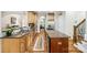 Spacious kitchen featuring a large island, granite countertops, and stainless steel appliances at 6795 Montgomery Rd, Lake Wylie, SC 29710