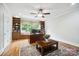 This home office offers built-in shelving, desk, and a window nook at 6795 Montgomery Rd, Lake Wylie, SC 29710