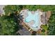Aerial view of community pool, showcasing ample seating, playground, and well-maintained amenities for residents at 6795 Montgomery Rd, Lake Wylie, SC 29710