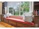 A cozy window nook with built-in storage and plush cushions offers a relaxing retreat at 6795 Montgomery Rd, Lake Wylie, SC 29710