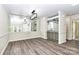 Stylish dining area featuring an elegant mirrored wall and a convenient wet bar for entertaining at 7123 Meeting St, Charlotte, NC 28210
