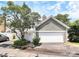 Charming home with a well-maintained yard, a garage and mature trees offering curb appeal at 7123 Meeting St, Charlotte, NC 28210
