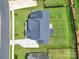 Aerial shot of a well-maintained home showcasing the roof, lawn, and driveway at 7160 Sumters Camp Trl, Indian Land, SC 29707