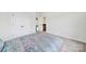 Cozy bedroom featuring a bed with floral patterned bedding and double doors to a closet at 7160 Sumters Camp Trl, Indian Land, SC 29707