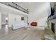 Bright and airy living room with a fireplace, modern furniture, and hardwood floors at 7160 Sumters Camp Trl, Indian Land, SC 29707