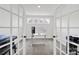 Bright office with French doors, neutral carpet, desk with monitors, and abundant natural light at 7160 Sumters Camp Trl, Indian Land, SC 29707