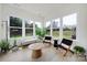 Bright sunroom with lots of natural light and views of the fenced backyard at 7160 Sumters Camp Trl, Indian Land, SC 29707