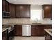 Gourmet kitchen featuring granite countertops and stainless steel appliances at 728 Morningside Dr, Mount Holly, NC 28120