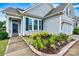 Close up of the entry and garden of this beautiful home, highlighting the sidewalk access at 7362 Overjoyed Xing, Charlotte, NC 28215
