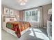 Charming bedroom with colorful bedding, natural light from a large window, and stylish decor at 7513 Lancaster Hwy # 6, Waxhaw, NC 28173
