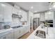Well-equipped kitchen showcasing modern appliances and white cabinetry at 7513 Lancaster Hwy # 6, Waxhaw, NC 28173