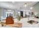 Stylish kitchen island with marble countertops overlooks open living space at 7513 Lancaster Hwy # 6, Waxhaw, NC 28173