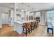 Spacious kitchen featuring a large island with seating and modern light fixtures at 7513 Lancaster Hwy # 6, Waxhaw, NC 28173