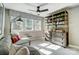 Comfortable living room with sofa and bookshelf in front of a window at 7513 Lancaster Hwy # 6, Waxhaw, NC 28173