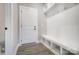 Convenient mudroom with built-in bench, cubbies, and hooks at 7513 Lancaster Hwy # 6, Waxhaw, NC 28173
