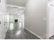 Spacious living room showcasing stylish wood floors, fireplace, and abundant natural light at 8339 Hornwood Ct, Charlotte, NC 28215