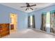 Comfortable bedroom with carpet flooring and natural light at 8914 Landsdowne Ave, Harrisburg, NC 28075