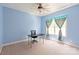 Cozy bedroom with ceiling fan and natural light at 8914 Landsdowne Ave, Harrisburg, NC 28075