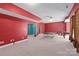 Spacious recreation room with ping pong table and vibrant wall colors for entertainment and leisure at 8914 Landsdowne Ave, Harrisburg, NC 28075