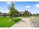 Community clubhouse with manicured lawn and inviting entrance at 9109 Liberty Hill Dr, Mint Hill, NC 28227