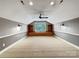 Bonus room with built in bookcases and carpet at 1000 Sarandon Dr, Matthews, NC 28104
