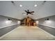 Bonus room with bar area and carpet at 1000 Sarandon Dr, Matthews, NC 28104