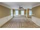 Bonus room with neutral carpet and classic trim at 1000 Sarandon Dr, Matthews, NC 28104