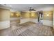 Bonus room with neutral carpet and classic trim at 1000 Sarandon Dr, Matthews, NC 28104