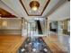 Spacious foyer with marble floors and staircase at 1000 Sarandon Dr, Matthews, NC 28104