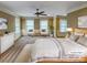Bright primary bedroom with neutral tones and ample natural light at 1000 Sarandon Dr, Matthews, NC 28104