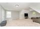 Large bonus room with neutral walls, carpeting, and ample space for entertainment or relaxation at 1147 Anduin Falls Dr, Charlotte, NC 28269