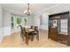 Dining room featuring natural light, a bay window, and hardwood floors at 1147 Anduin Falls Dr, Charlotte, NC 28269
