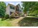 Charming exterior view of a two-story home with a brick and siding facade and landscaped front yard at 1147 Anduin Falls Dr, Charlotte, NC 28269