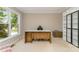 Office space with a built-in bookcase, a large window, and neutral carpeting at 1147 Anduin Falls Dr, Charlotte, NC 28269