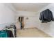 Spacious walk-in closet with ample shelving and hanging space for organized storage and convenience at 1147 Anduin Falls Dr, Charlotte, NC 28269