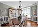 Beautiful dining room with a wooden table and chairs and natural light at 117 Lake Hills Dr, Mooresville, NC 28117