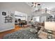 Bright and open living room with hardwood floors, high ceilings, and stylish decor at 117 Lake Hills Dr, Mooresville, NC 28117
