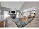 Cozy living room featuring a fireplace, vaulted ceilings, and hardwood floors at 117 Lake Hills Dr, Mooresville, NC 28117