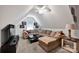 Cozy living room with vaulted ceilings and sectional sofa, perfect for relaxation at 117 Lake Hills Dr, Mooresville, NC 28117