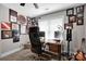 Office space with a wooden desk, multiple monitors, and decorated with pictures and posters at 117 Lake Hills Dr, Mooresville, NC 28117