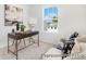 Calm bedroom featuring contemporary decor, a work space with desk, and plenty of natural light at 11716 Avocet St # 75, Charlotte, NC 28215