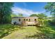 Expansive backyard with a wooden deck, perfect for outdoor gatherings and relaxation amidst lush greenery at 1215 Cardinal Dr # 9, Gastonia, NC 28052