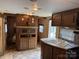 Kitchen and Living Area creates a modern, functional layout for cooking and relaxation at 131 Twin Bluff Trl, Mount Gilead, NC 27306