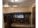 Cozy living room with overhead bunk; great for relaxing after a long day at 131 Twin Bluff Trl, Mount Gilead, NC 27306