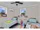bedroom featuring twin beds, natural light and wood-look flooring at 134 Snowbird Loop, Statesville, NC 28625