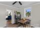 Inviting dining area with table, seating, and natural light with views to the yard at 134 Snowbird Loop, Statesville, NC 28625