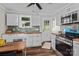 Bright kitchen with updated appliances, wooden countertops and subway tile backsplash at 134 Snowbird Loop, Statesville, NC 28625