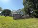 Backyard with a large wooden deck and green grass at 1445 33Rd Sw St, Hickory, NC 28602
